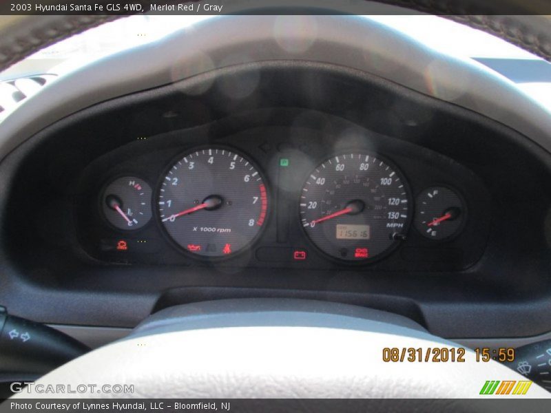 Merlot Red / Gray 2003 Hyundai Santa Fe GLS 4WD