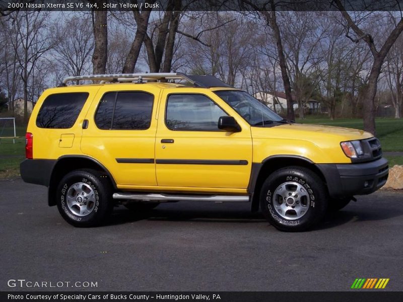 Solar Yellow / Dusk 2000 Nissan Xterra SE V6 4x4