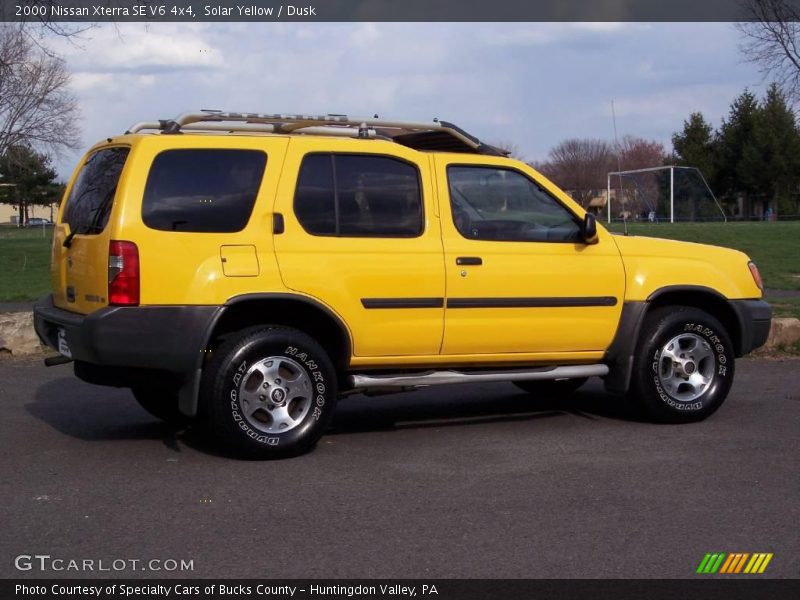 Solar Yellow / Dusk 2000 Nissan Xterra SE V6 4x4