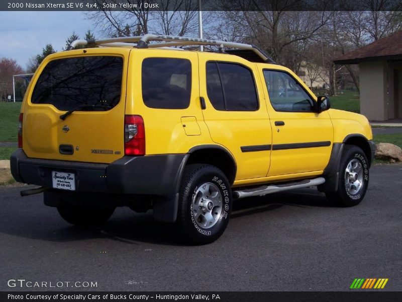 Solar Yellow / Dusk 2000 Nissan Xterra SE V6 4x4