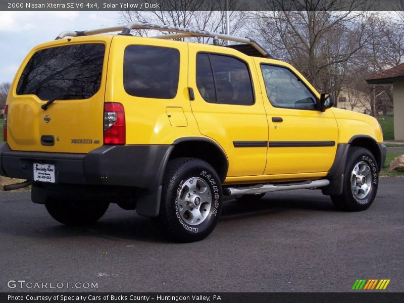 Solar Yellow / Dusk 2000 Nissan Xterra SE V6 4x4