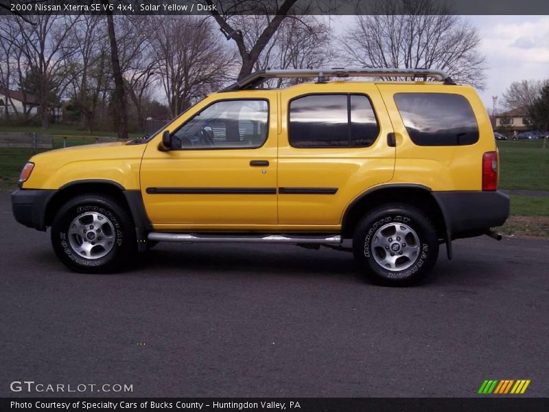 Solar Yellow / Dusk 2000 Nissan Xterra SE V6 4x4