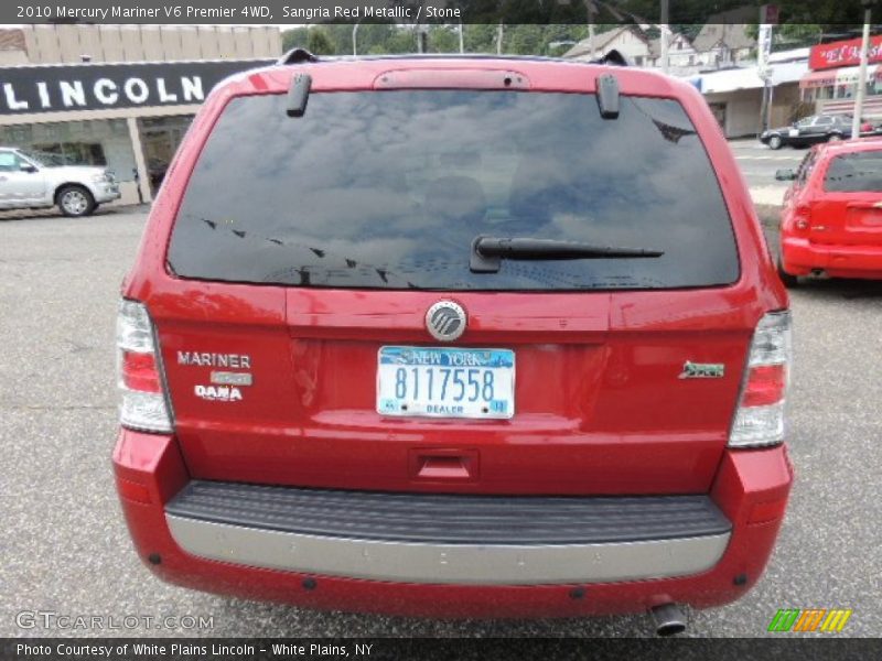 Sangria Red Metallic / Stone 2010 Mercury Mariner V6 Premier 4WD