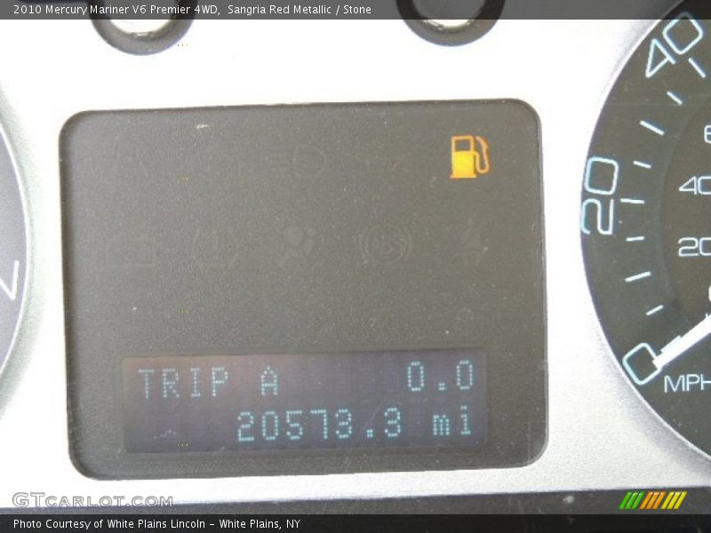 Sangria Red Metallic / Stone 2010 Mercury Mariner V6 Premier 4WD