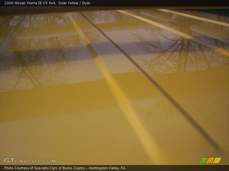 Solar Yellow / Dusk 2000 Nissan Xterra SE V6 4x4