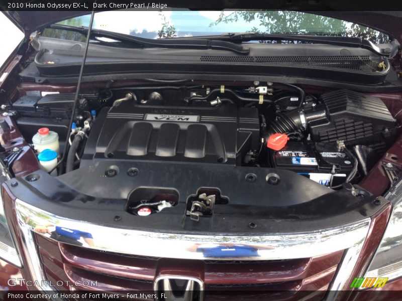 Dark Cherry Pearl / Beige 2010 Honda Odyssey EX-L
