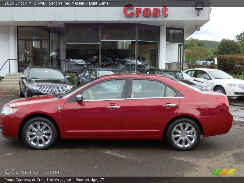 Sangria Red Metallic / Light Camel 2010 Lincoln MKZ AWD