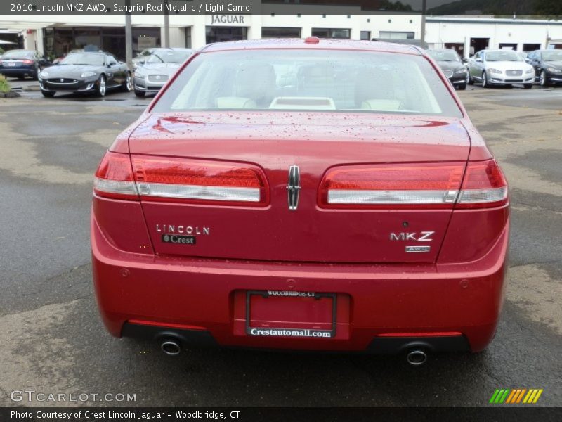 Sangria Red Metallic / Light Camel 2010 Lincoln MKZ AWD