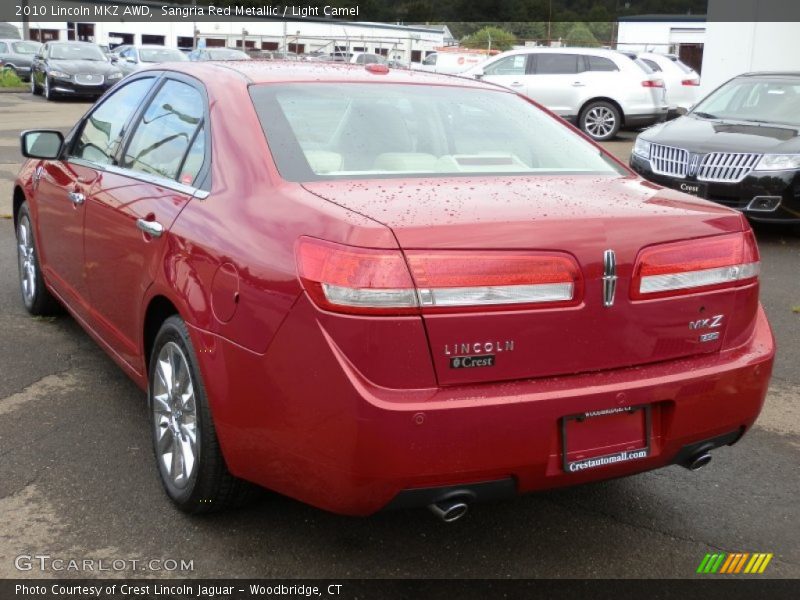 Sangria Red Metallic / Light Camel 2010 Lincoln MKZ AWD