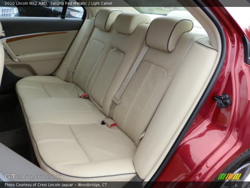 Sangria Red Metallic / Light Camel 2010 Lincoln MKZ AWD