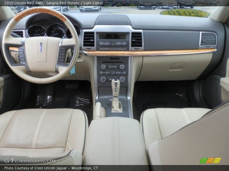 Sangria Red Metallic / Light Camel 2010 Lincoln MKZ AWD