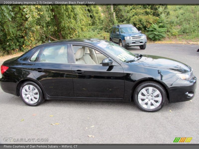 Obsidian Black Pearl / Ivory 2009 Subaru Impreza 2.5i Sedan