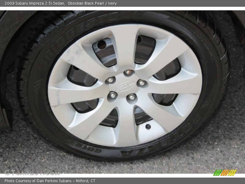 Obsidian Black Pearl / Ivory 2009 Subaru Impreza 2.5i Sedan
