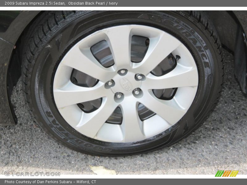 Obsidian Black Pearl / Ivory 2009 Subaru Impreza 2.5i Sedan