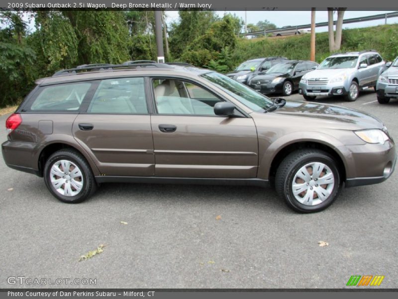 Deep Bronze Metallic / Warm Ivory 2009 Subaru Outback 2.5i Wagon