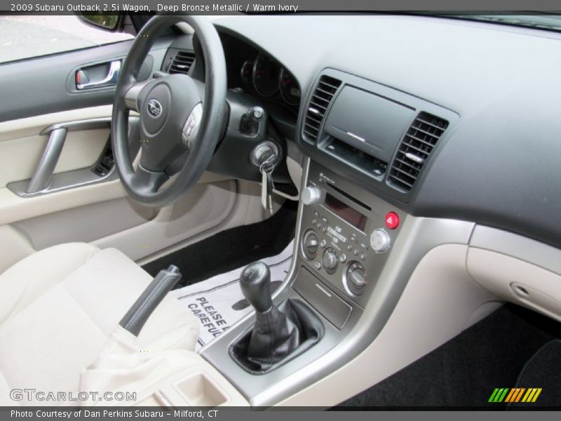 Deep Bronze Metallic / Warm Ivory 2009 Subaru Outback 2.5i Wagon