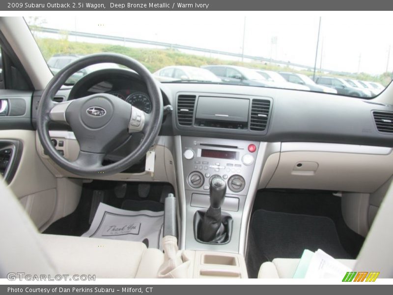 Deep Bronze Metallic / Warm Ivory 2009 Subaru Outback 2.5i Wagon