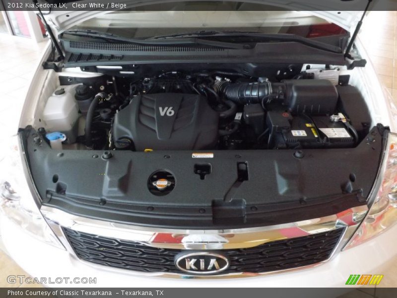 Clear White / Beige 2012 Kia Sedona LX