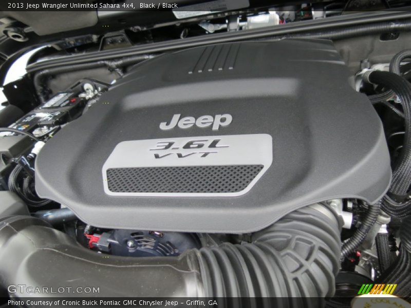 Black / Black 2013 Jeep Wrangler Unlimited Sahara 4x4