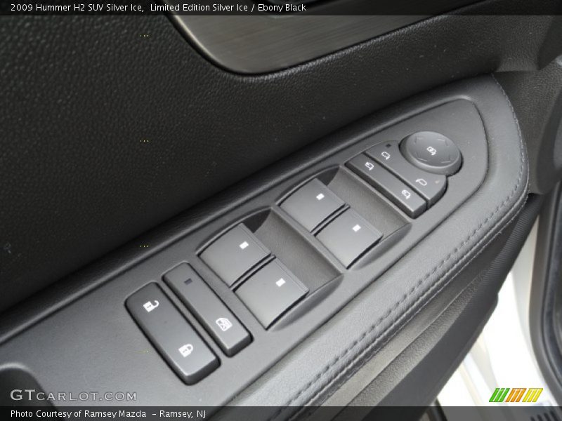 Controls of 2009 H2 SUV Silver Ice