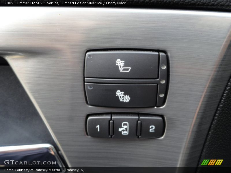 Controls of 2009 H2 SUV Silver Ice