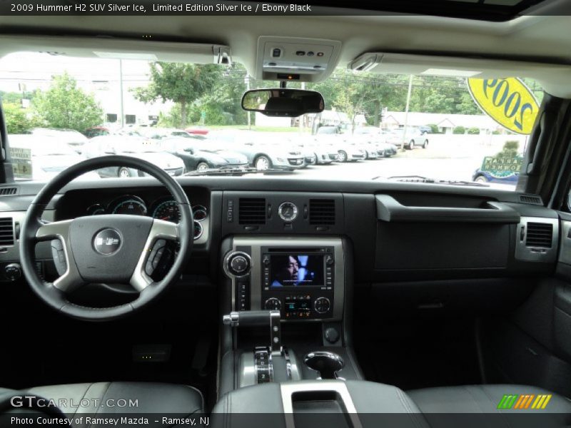 Dashboard of 2009 H2 SUV Silver Ice