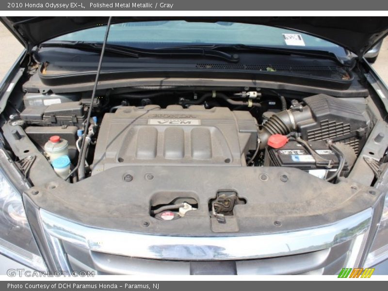Polished Metal Metallic / Gray 2010 Honda Odyssey EX-L