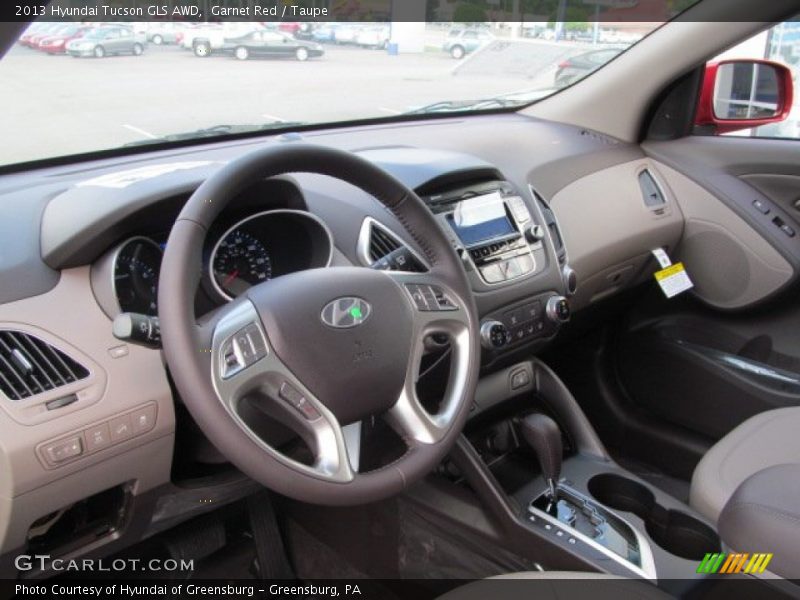 Garnet Red / Taupe 2013 Hyundai Tucson GLS AWD