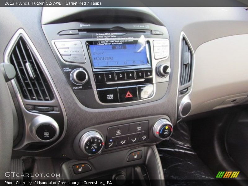 Garnet Red / Taupe 2013 Hyundai Tucson GLS AWD