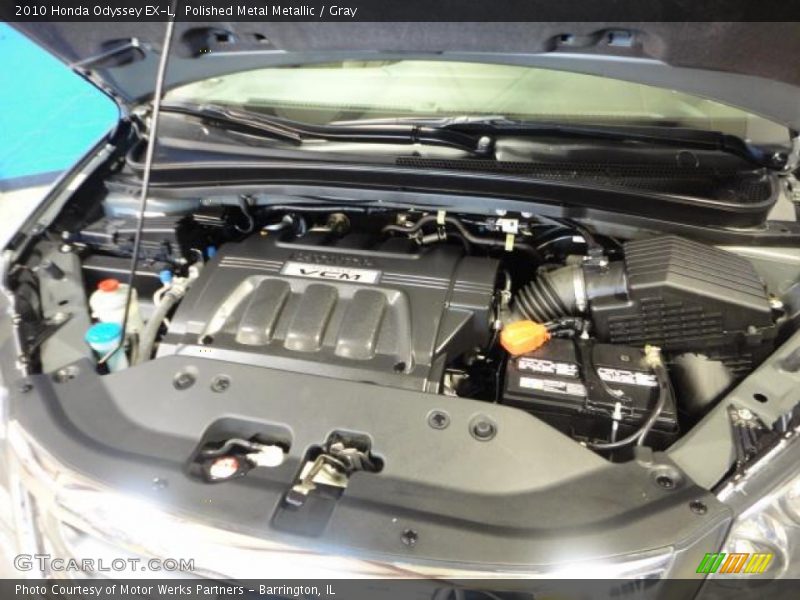 Polished Metal Metallic / Gray 2010 Honda Odyssey EX-L