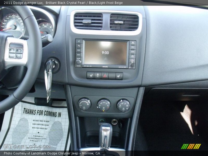 Brilliant Black Crystal Pearl / Black/Light Frost Beige 2011 Dodge Avenger Lux