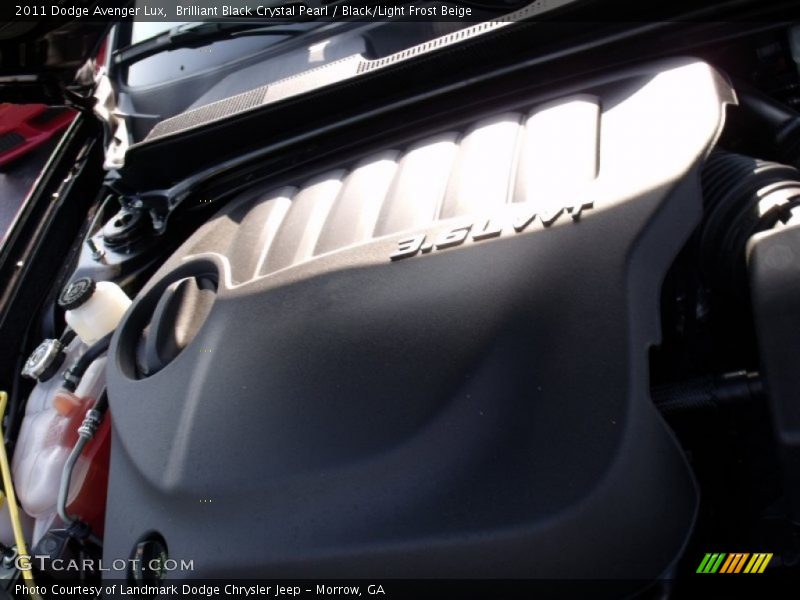 Brilliant Black Crystal Pearl / Black/Light Frost Beige 2011 Dodge Avenger Lux