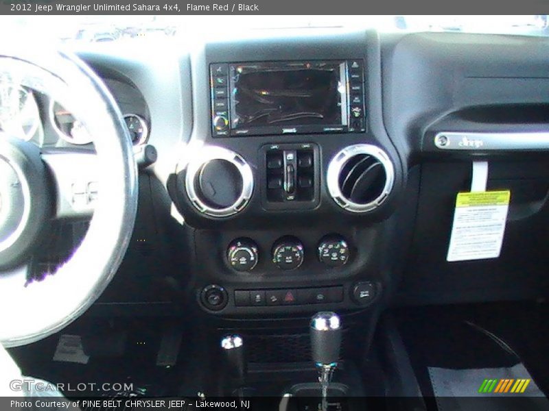 Flame Red / Black 2012 Jeep Wrangler Unlimited Sahara 4x4