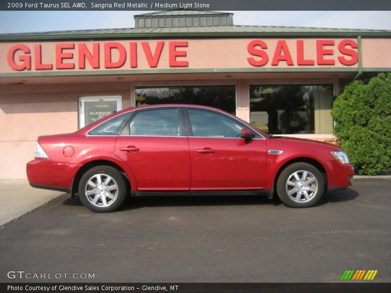 Sangria Red Metallic / Medium Light Stone 2009 Ford Taurus SEL AWD