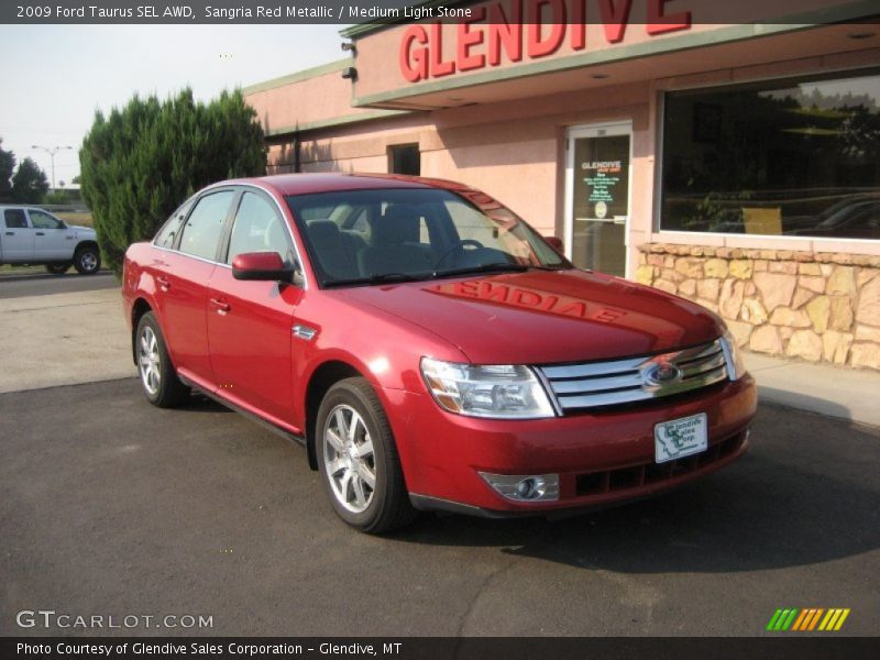 Sangria Red Metallic / Medium Light Stone 2009 Ford Taurus SEL AWD