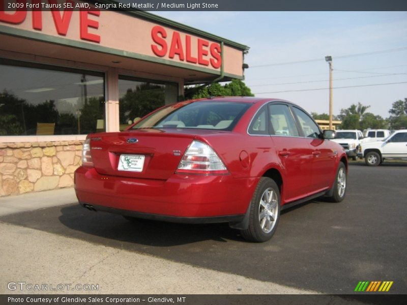 Sangria Red Metallic / Medium Light Stone 2009 Ford Taurus SEL AWD