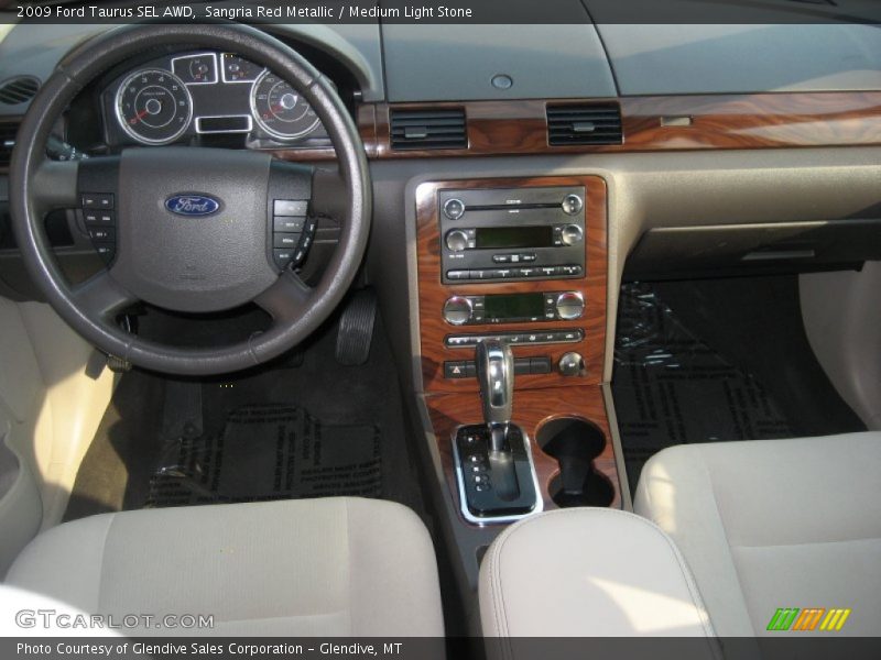 Sangria Red Metallic / Medium Light Stone 2009 Ford Taurus SEL AWD