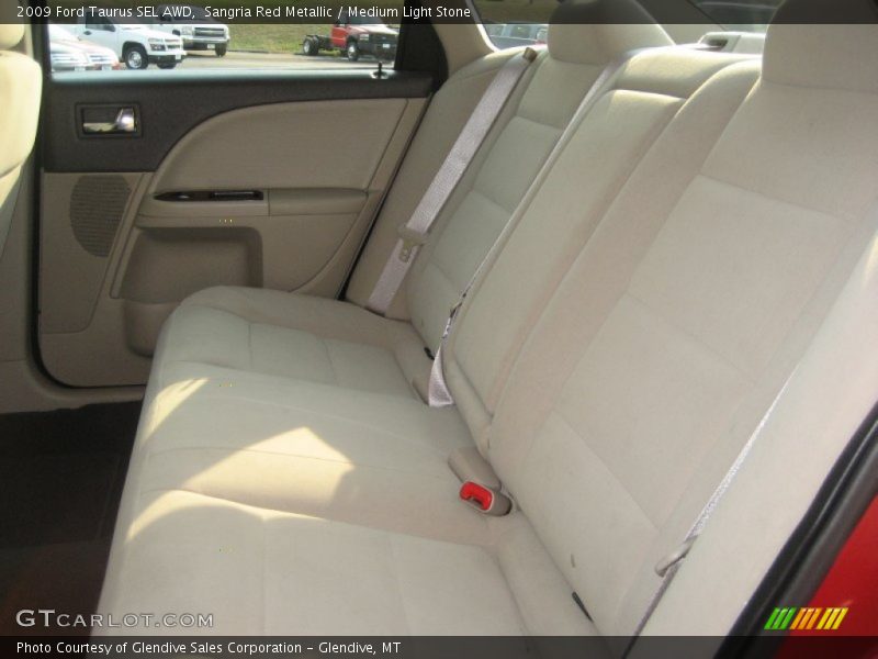 Sangria Red Metallic / Medium Light Stone 2009 Ford Taurus SEL AWD
