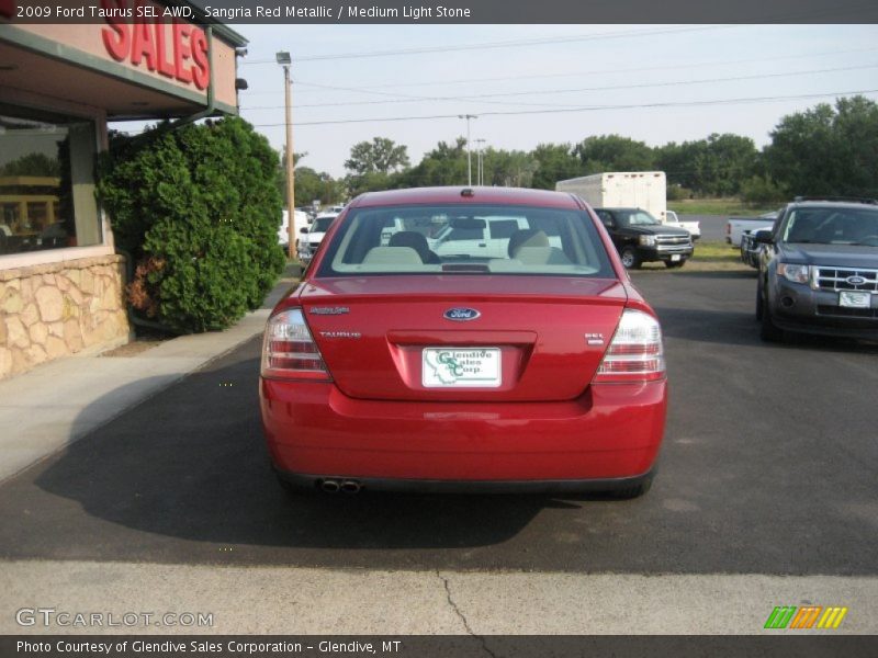 Sangria Red Metallic / Medium Light Stone 2009 Ford Taurus SEL AWD