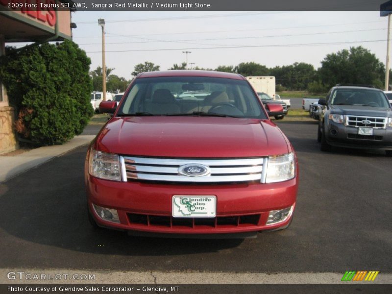 Sangria Red Metallic / Medium Light Stone 2009 Ford Taurus SEL AWD