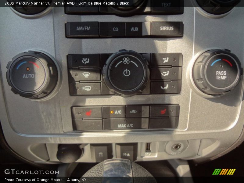 Light Ice Blue Metallic / Black 2009 Mercury Mariner V6 Premier 4WD