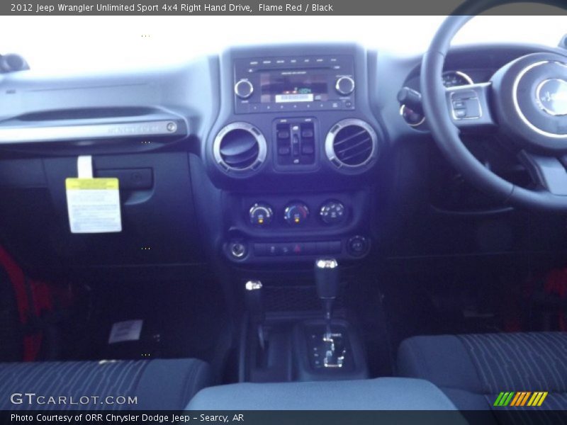 Flame Red / Black 2012 Jeep Wrangler Unlimited Sport 4x4 Right Hand Drive