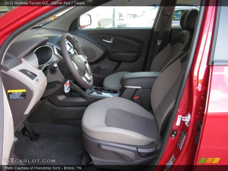 Garnet Red / Taupe 2013 Hyundai Tucson GLS