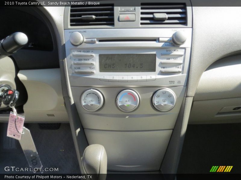 Sandy Beach Metallic / Bisque 2010 Toyota Camry LE