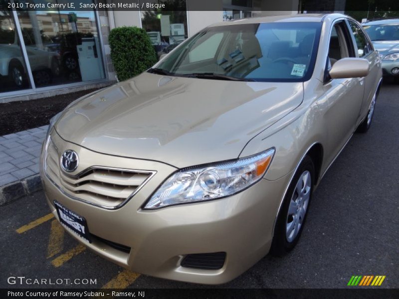 Sandy Beach Metallic / Bisque 2010 Toyota Camry LE