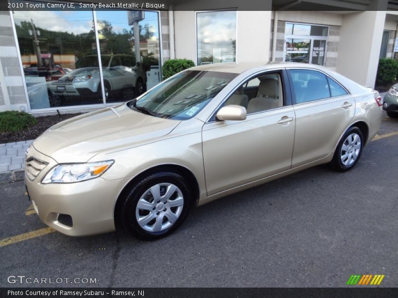 Sandy Beach Metallic / Bisque 2010 Toyota Camry LE
