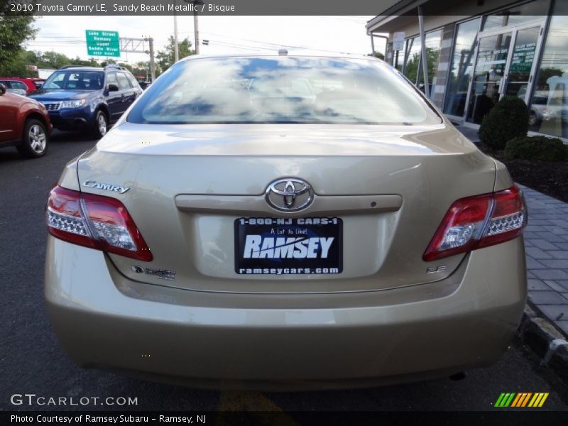 Sandy Beach Metallic / Bisque 2010 Toyota Camry LE