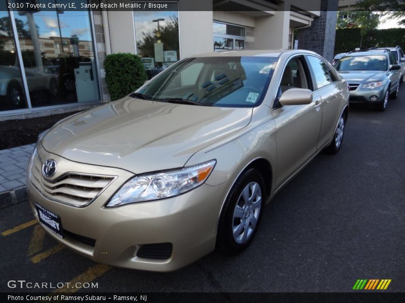 Sandy Beach Metallic / Bisque 2010 Toyota Camry LE
