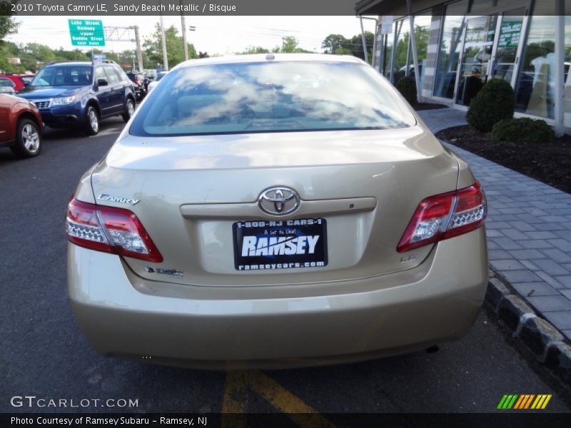 Sandy Beach Metallic / Bisque 2010 Toyota Camry LE