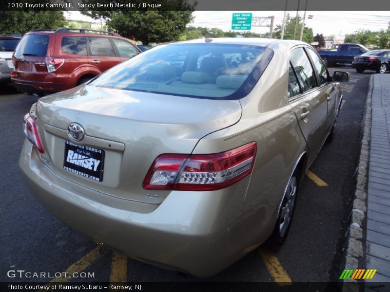 Sandy Beach Metallic / Bisque 2010 Toyota Camry LE
